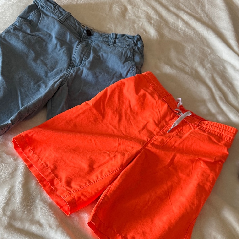 Abercrombie Kids Light Blue Shorts and orange swim shorts.